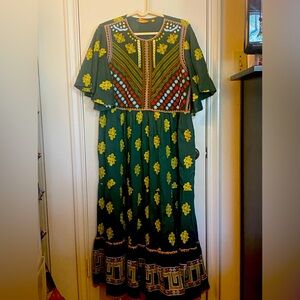 Flirty V’Neck MaxiLounge gown.